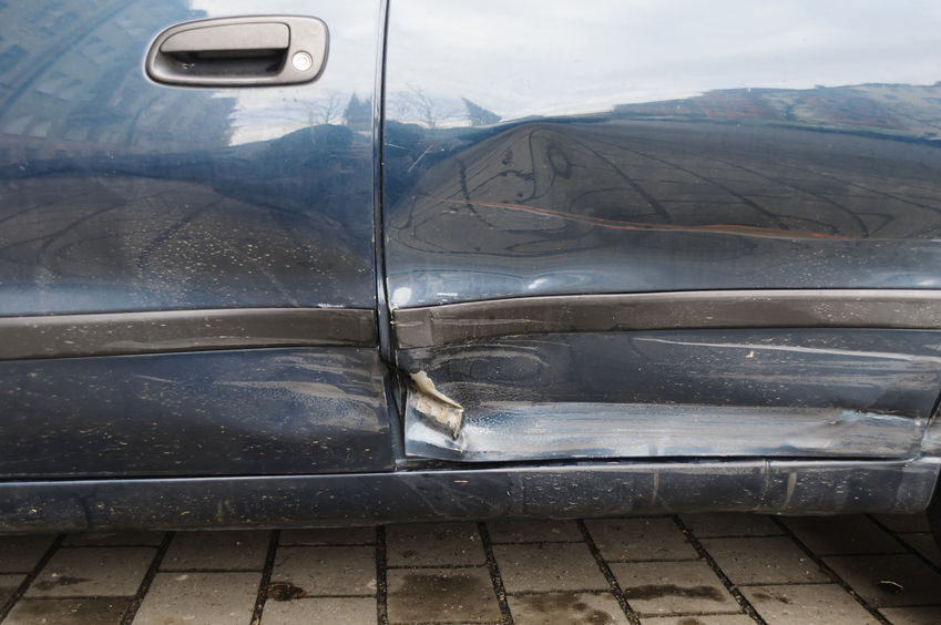car dent on side of car